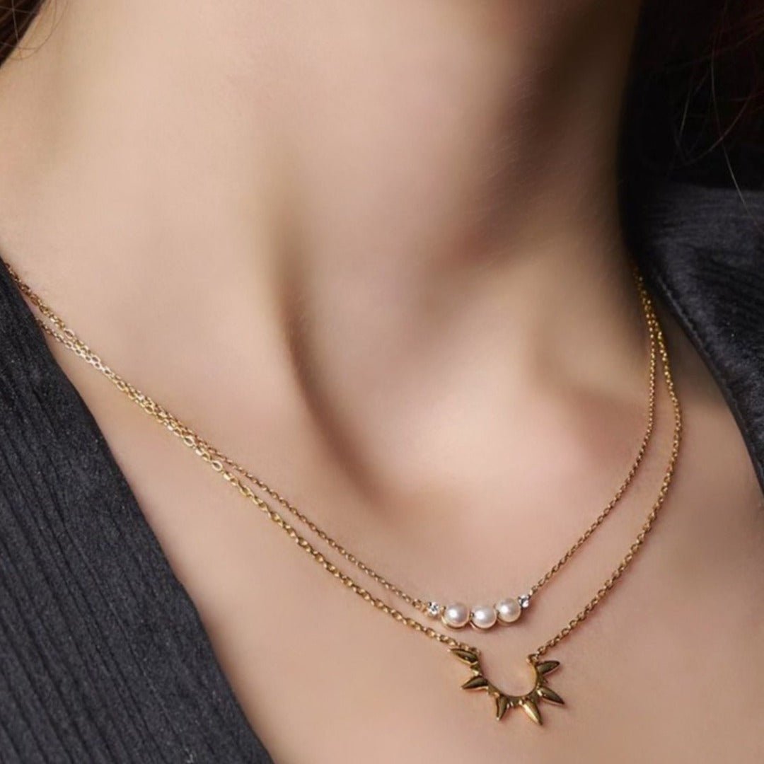 Pearl necklace in 18k yellow gold